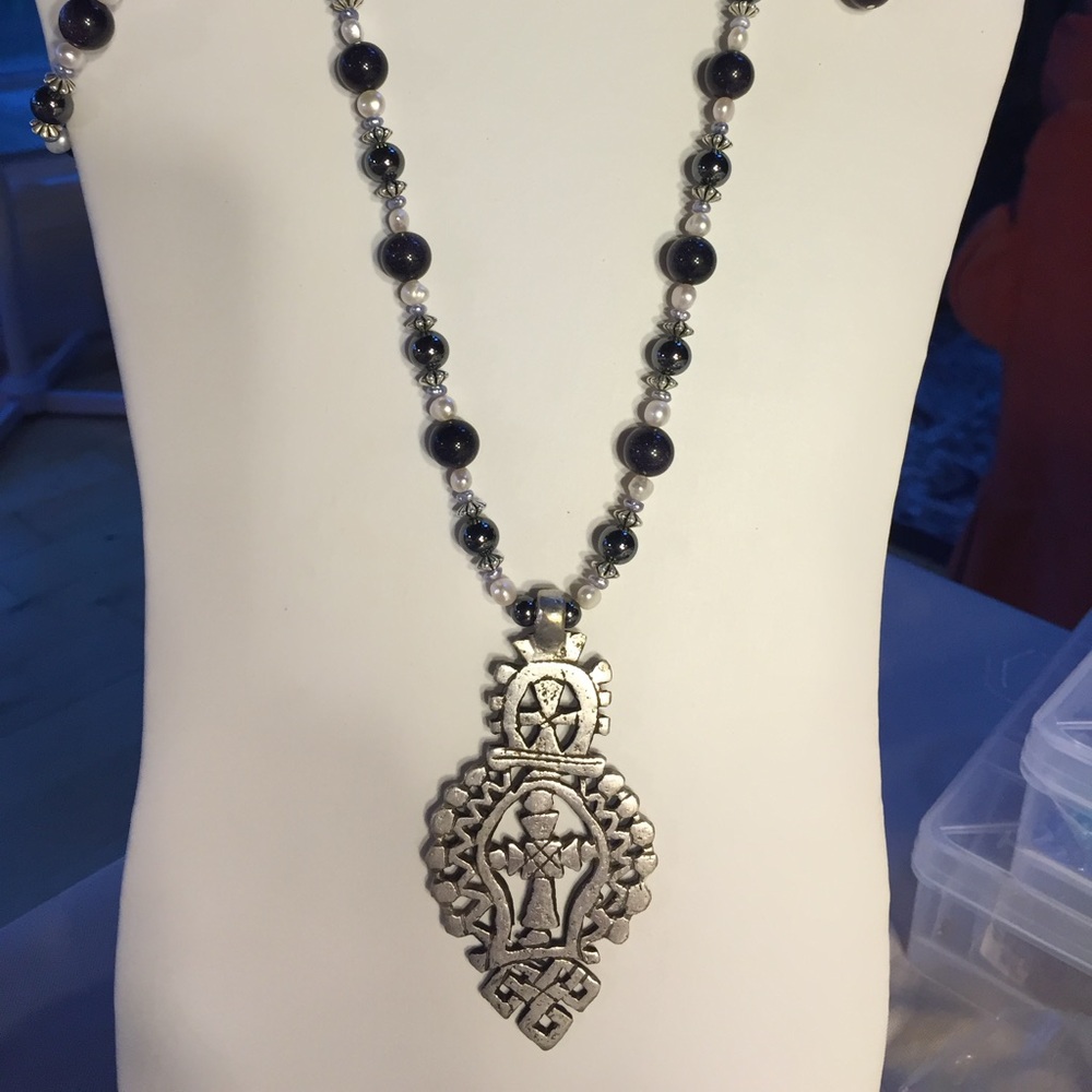 Blue goldstone, white and blue pearls with a large Coptic Cross